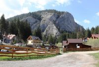 cabin guest house stones rocks hiking mountains hostel traditional romania