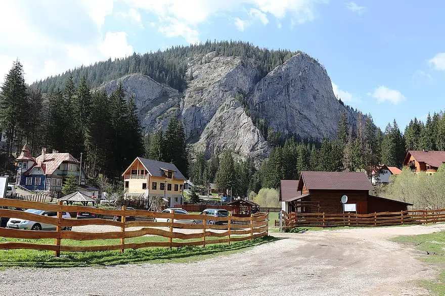 cabin guest house stones rocks hiking mountains hostel traditional romania