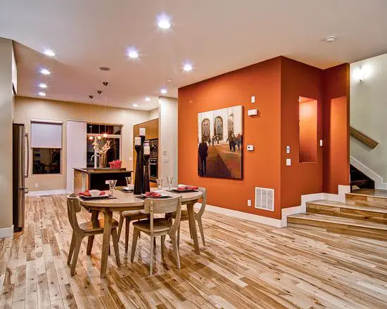 orange wall combination with wooden floor