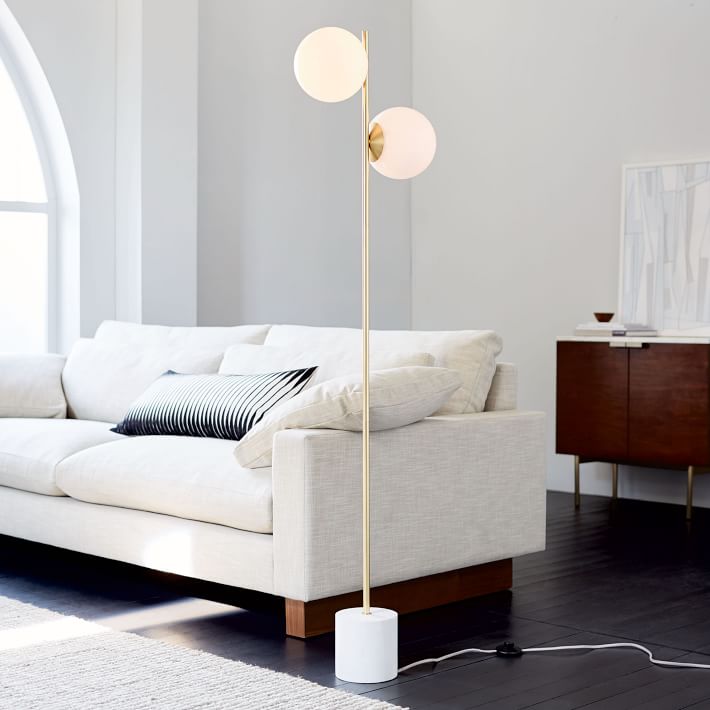sofa white color with pillows design