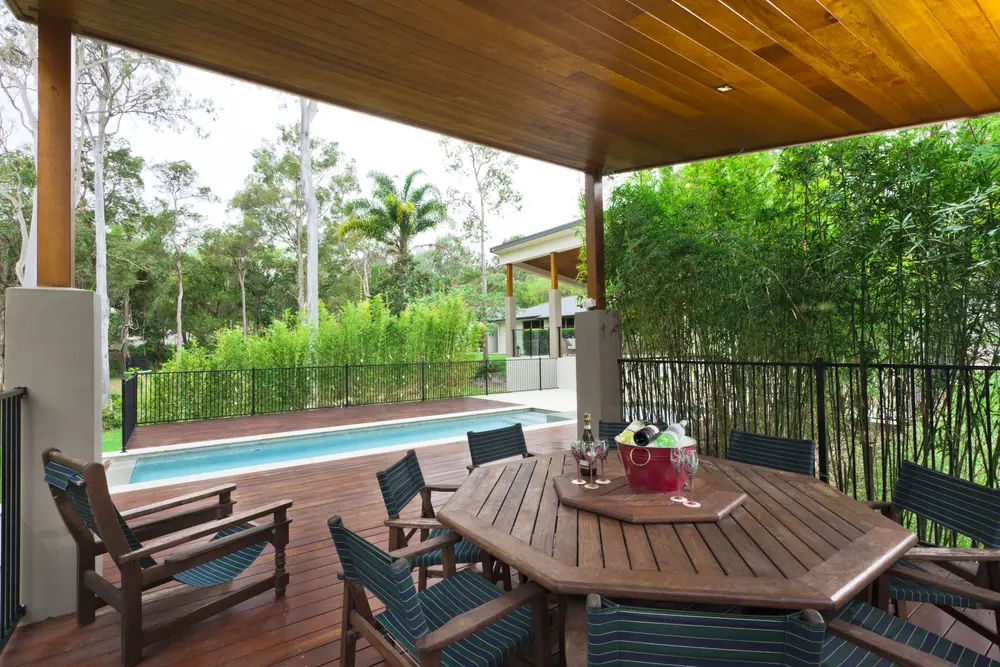 backyard dining area with pool