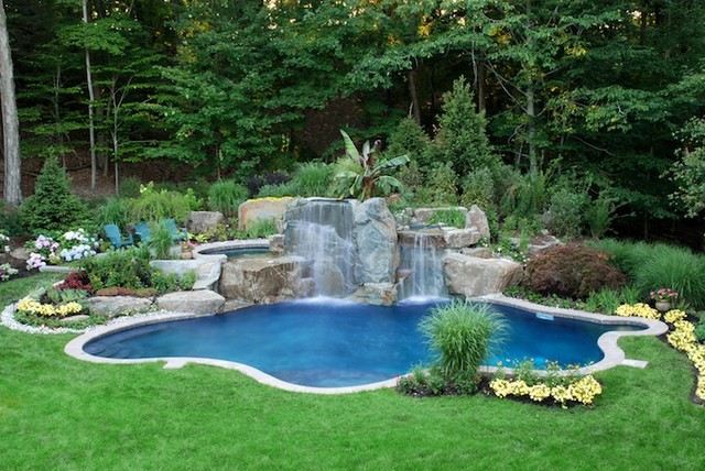 minimalist backyard waterfall with pond