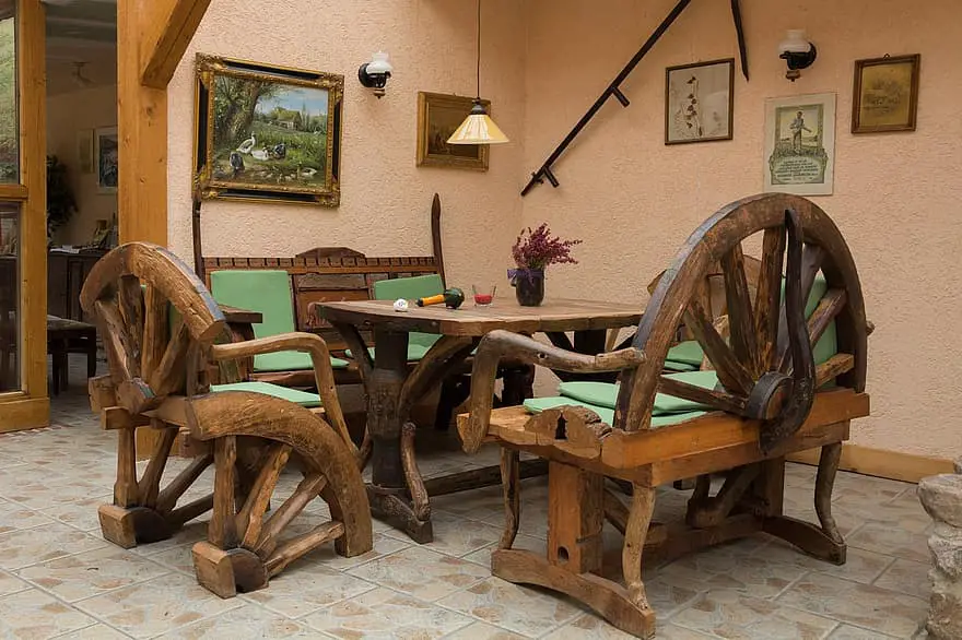 seating area rustic rural restaurant table bank chair covered quaint