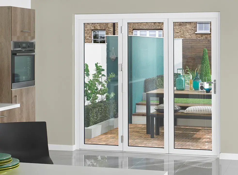 white aluminum triple doors