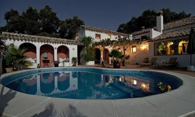 pool backyard villa house arches roof rich stars night