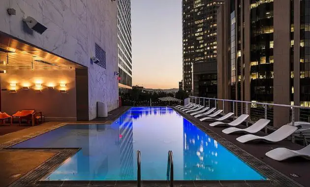 pool swimming rooftop hotel downtown city los angeles dusk twilight