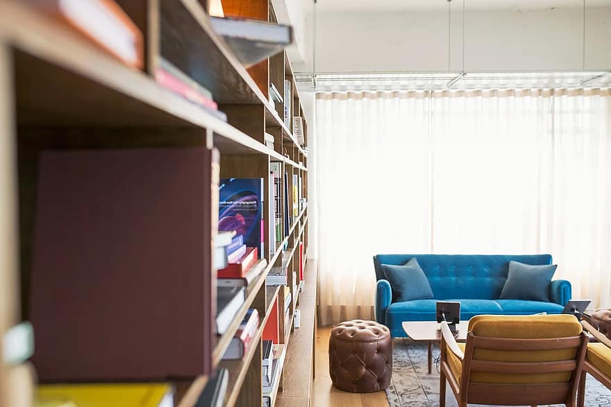 blur bookcase books colors colours contemporary depth of field furniture home