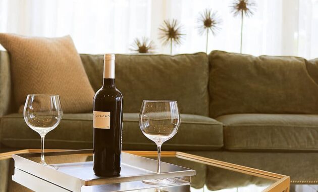 cozy furniture indoors sofa stemware table wine