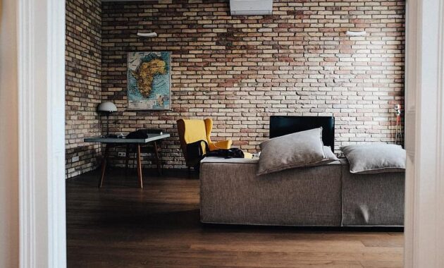house interior couch sofa living room brick