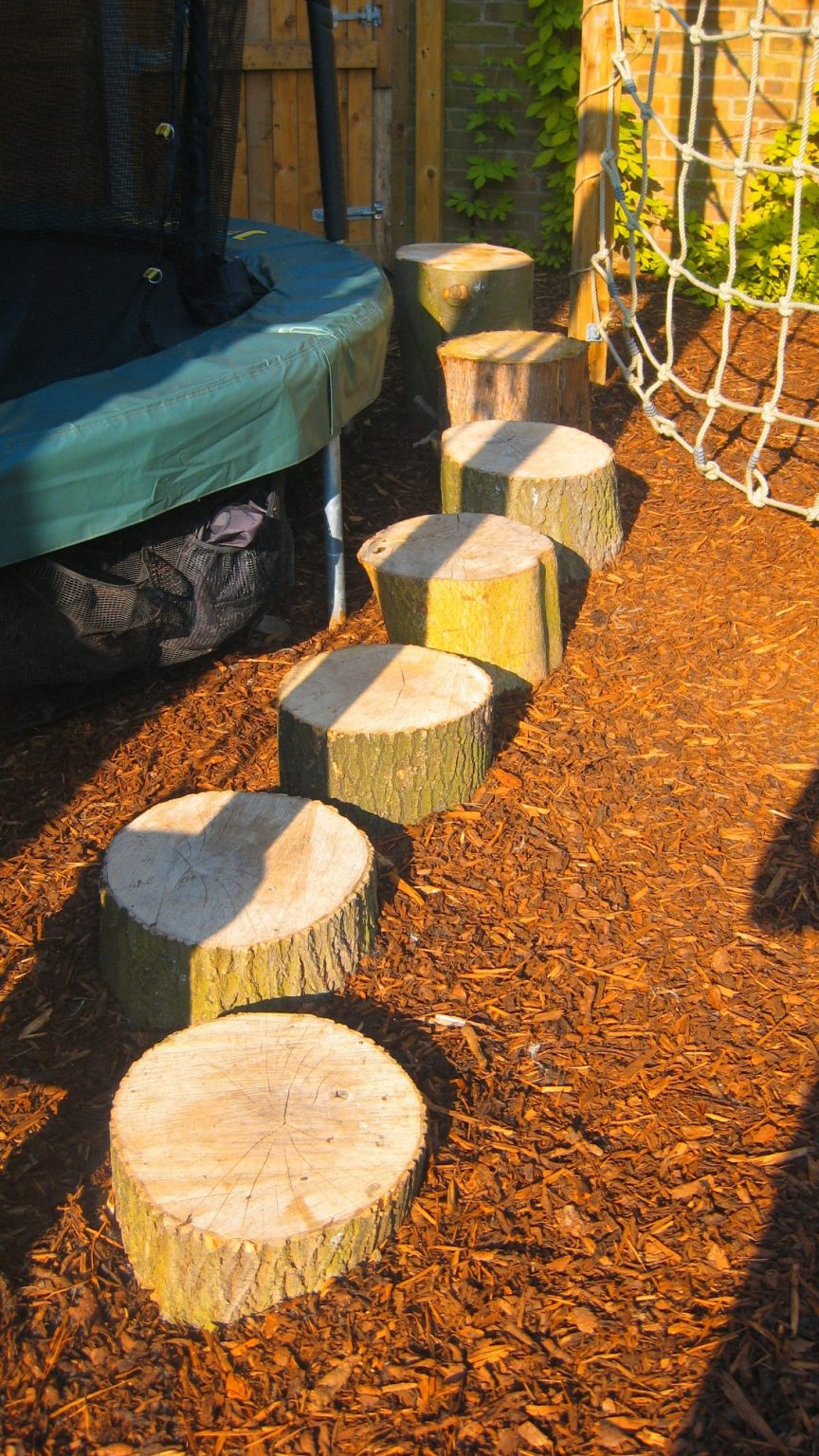 How to Decorate a Tree Stump in the Front Yard Instead of Cutting It Down