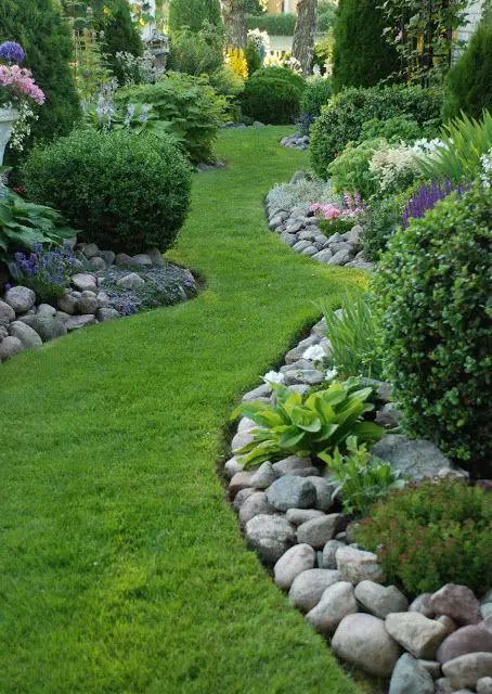 simple garden with stone and flower inspiration