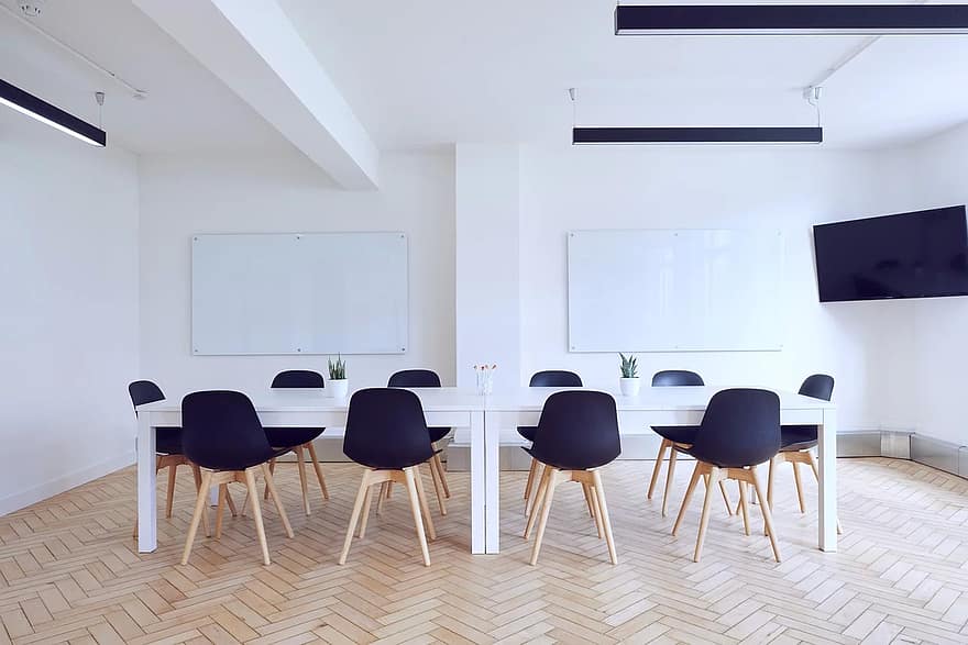 chairs conference room contemporary empty indoors interior design room table whiteboards