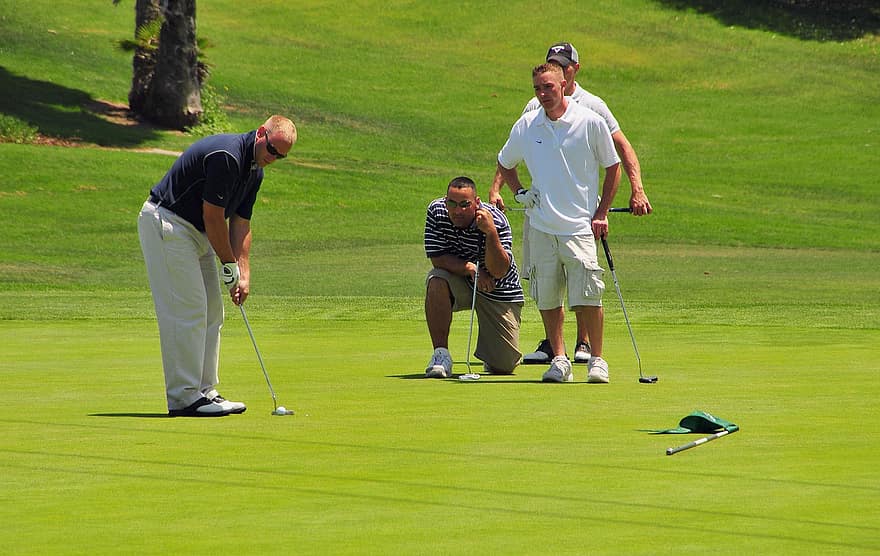 golfers golfing green putter putting caddy club ball course golfers golfing green putter putting caddy club ball course