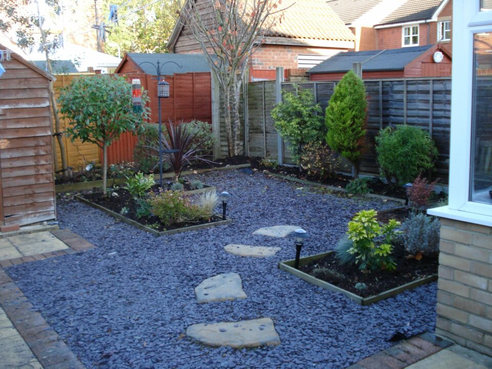 gravel and stone yard ideas no grass with planters