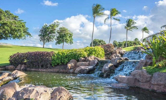 hawaii oahu waterfall rocks ko olina pond palm trees water landscape 1