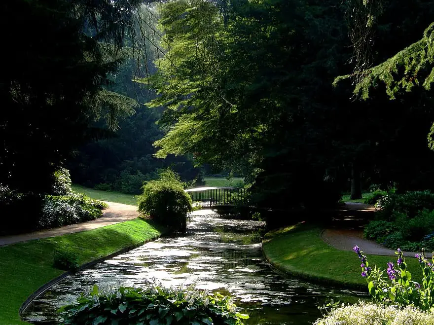 schlossgarten benrath dusseldorf park bridge castle pond park castle park horticulture germany