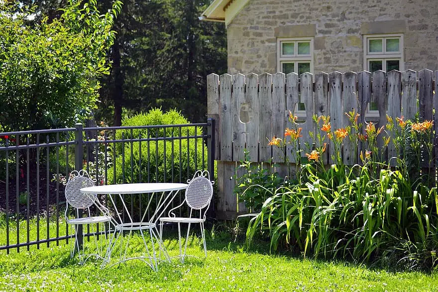 white outdoor patio furniture table two chairs set outside 1