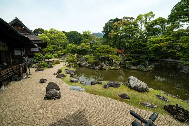 Beautiful house garden with traditional building and rock garden