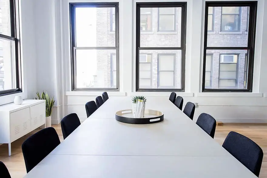 chairs empty office room table windows