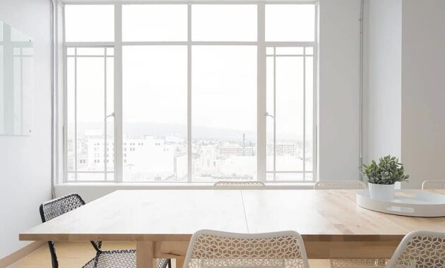 white room table chairs window glass vase flower plant