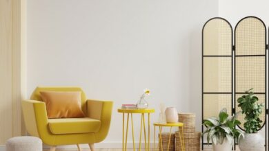 brown living room with yellow sofa ideas and wooden art