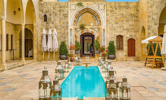 palace oriental pool swimming pool patio arcades arches architecture ancient
