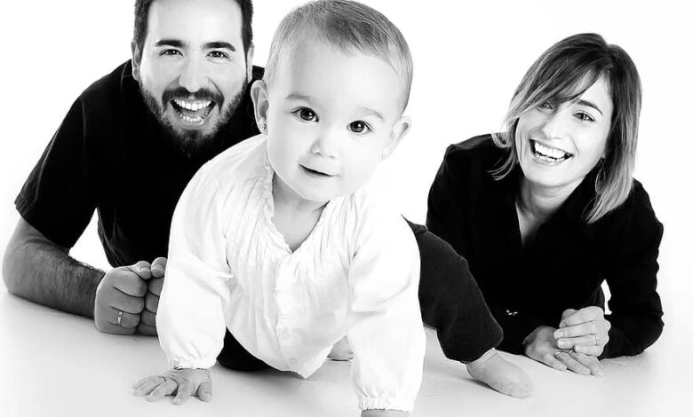 family baby crawling mother smiling happy happy children smile joy