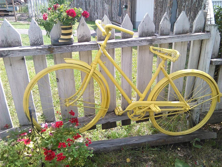 bicycle yellow yard art bike joyful