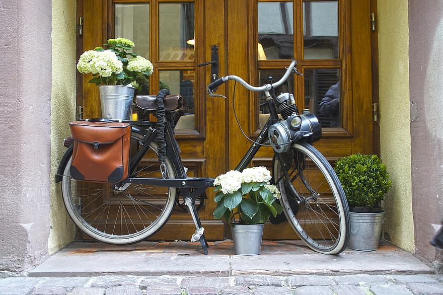 bike old house entrance wheel input nostalgia flowers front door entrance door