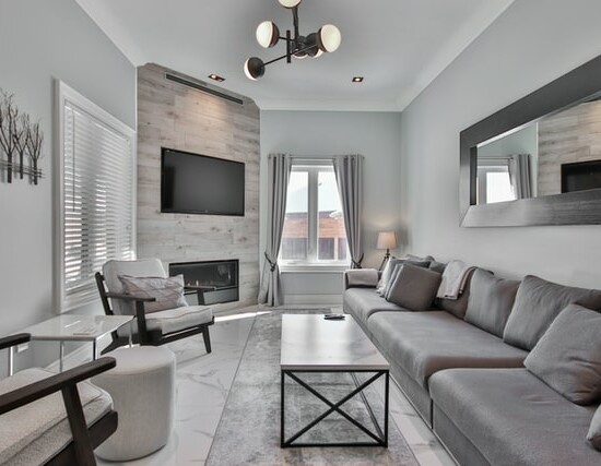 grey minimalist living room with fireplace